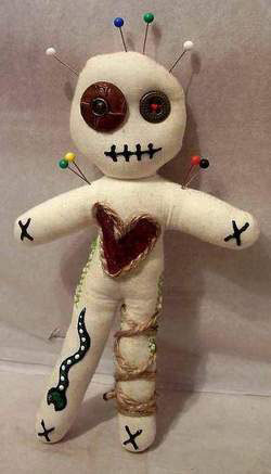 voodoo doll with needles